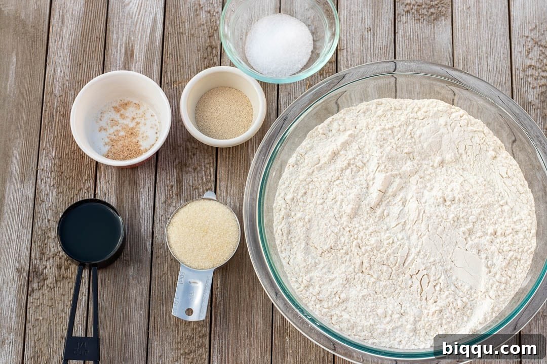 Perfect Everyday Sandwich Bread 4 Ingredients for Easy Sandwich Bread Recipe in bowls and measuring cups.