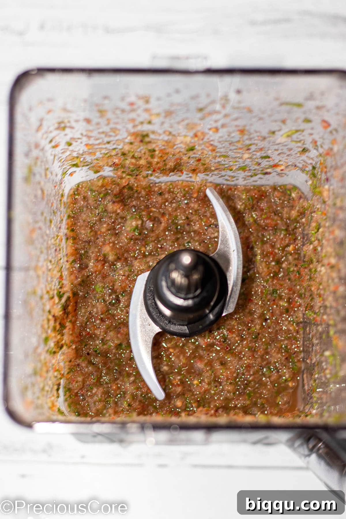 Pepper sauce ingredients blended in a blender.