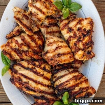 grilled boneless chicken thighs on a platter