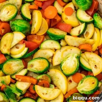 Sauteed vegetables in a braiser, visually appealing and ready to eat
