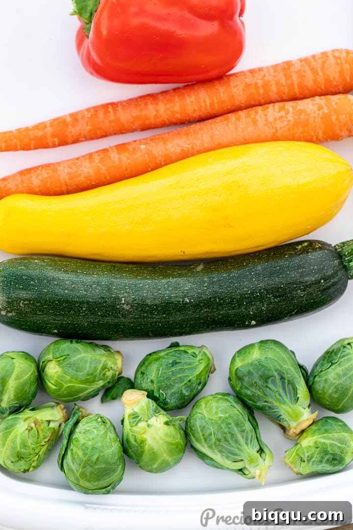 Vibrant Veggie Sauté 3 Assorted fresh vegetables neatly arranged on a tray, ready for preparation and cooking