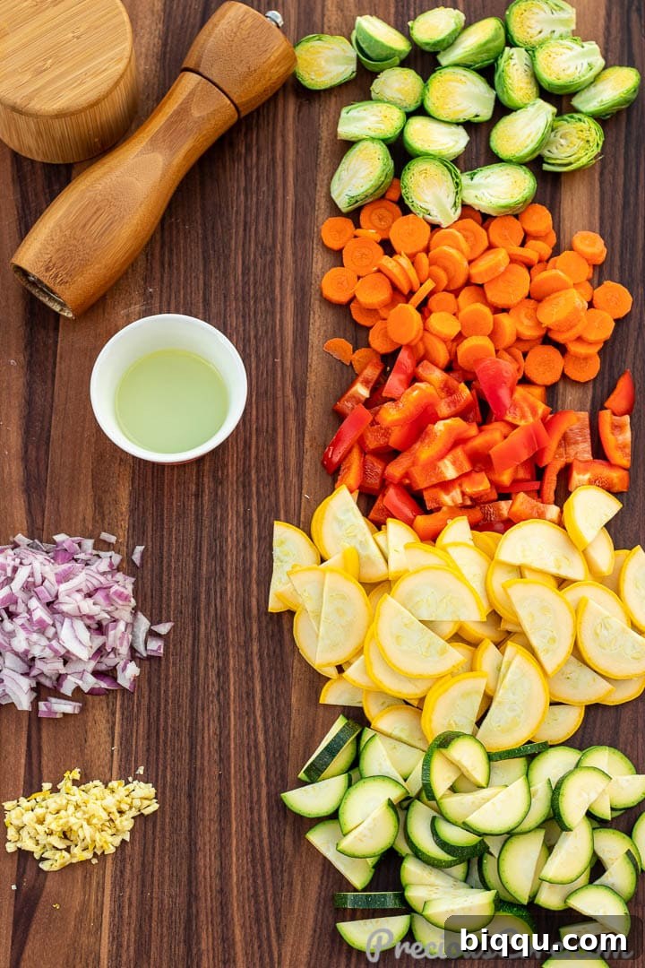 Vibrant Veggie Sauté 4 A selection of fresh ingredients for sautéed vegetables carefully laid out on a cutting board, ready for preparation