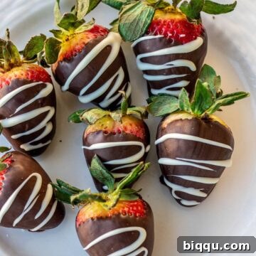 Chocolate dipped strawberries on a plate