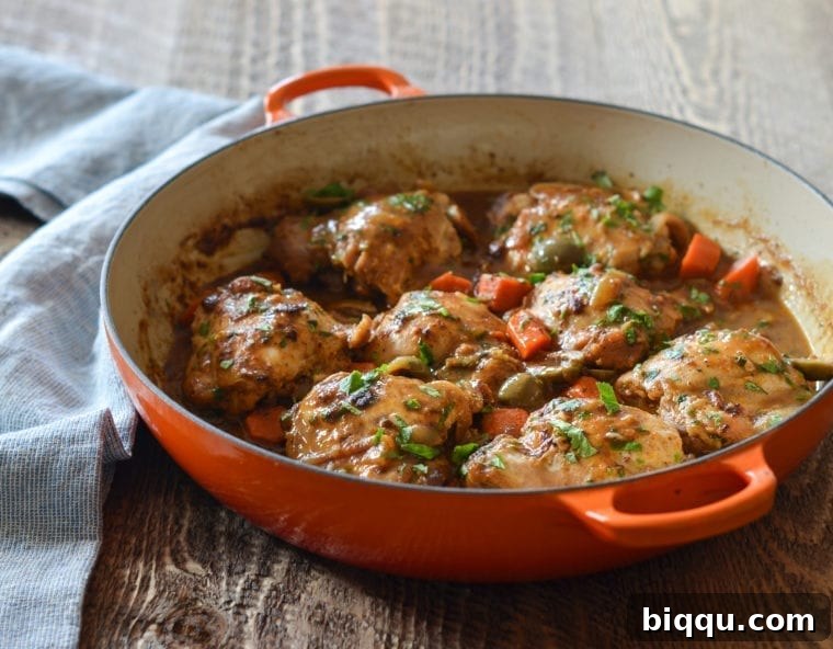 Chicken Tagine in a cast iron braiser, a fragrant North African dinner.