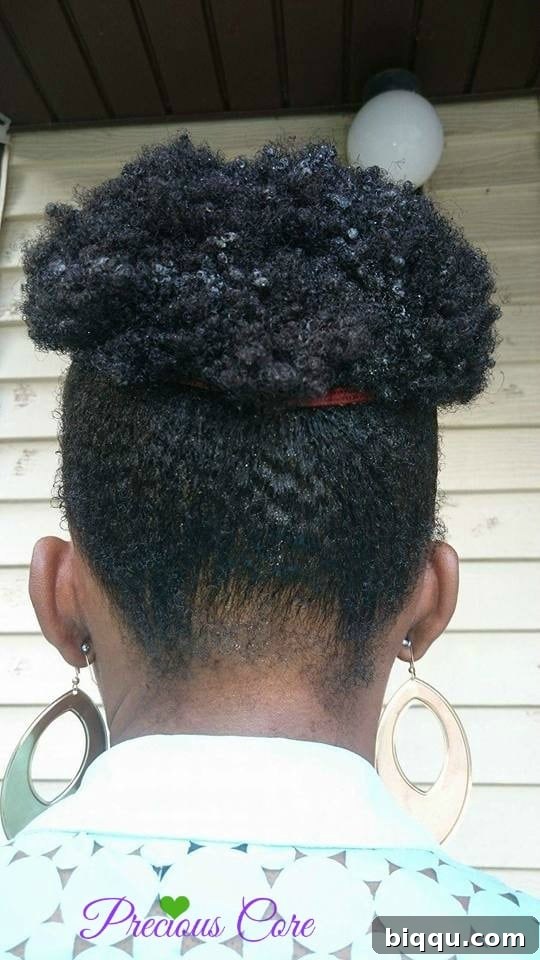 Author smiling with her freshly styled natural hair