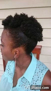 Author with a natural hair mohawk style