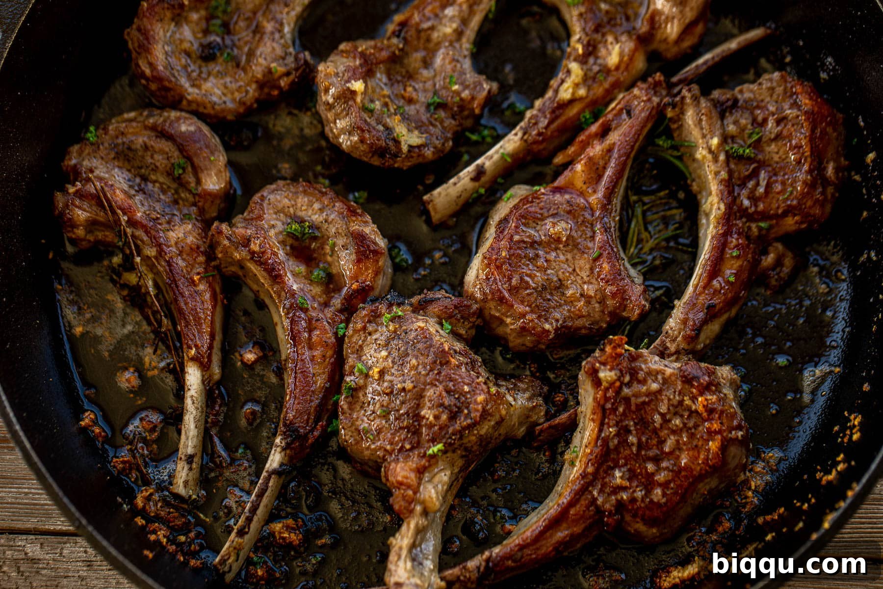 A stunning landscape photo of perfectly cooked lamb chops, beautifully arranged and ready to be served.