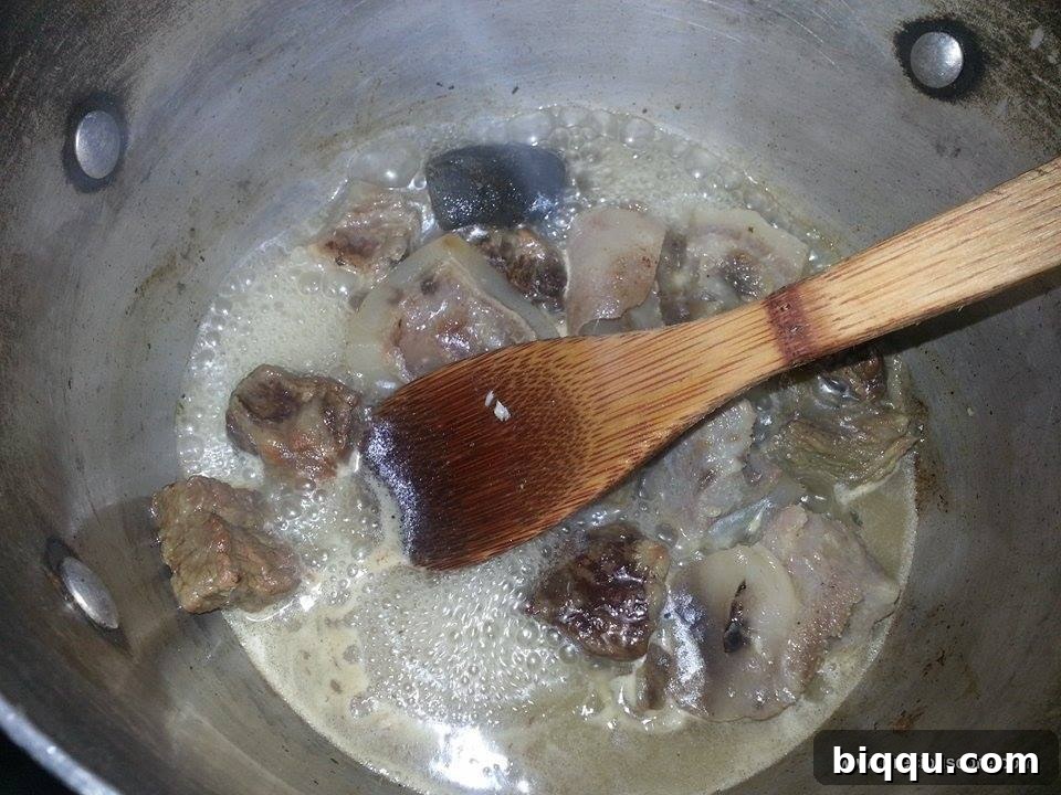 Boiled meat and fish with stock for soup