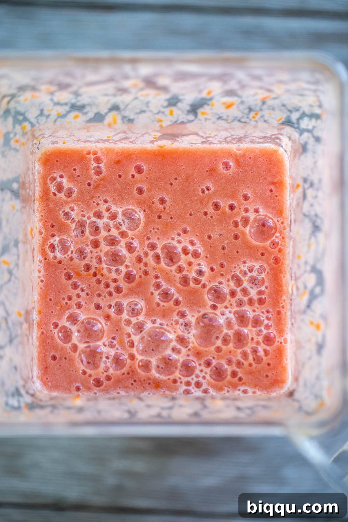 Smooth tomato puree swirling inside a blender