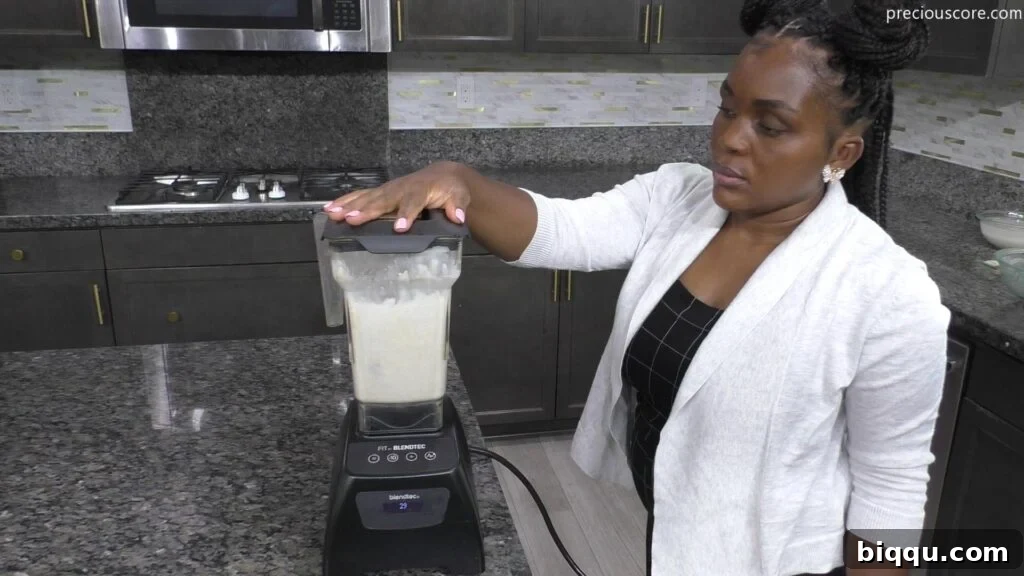 All rice pancake ingredients being blended together in a high-powered blender.