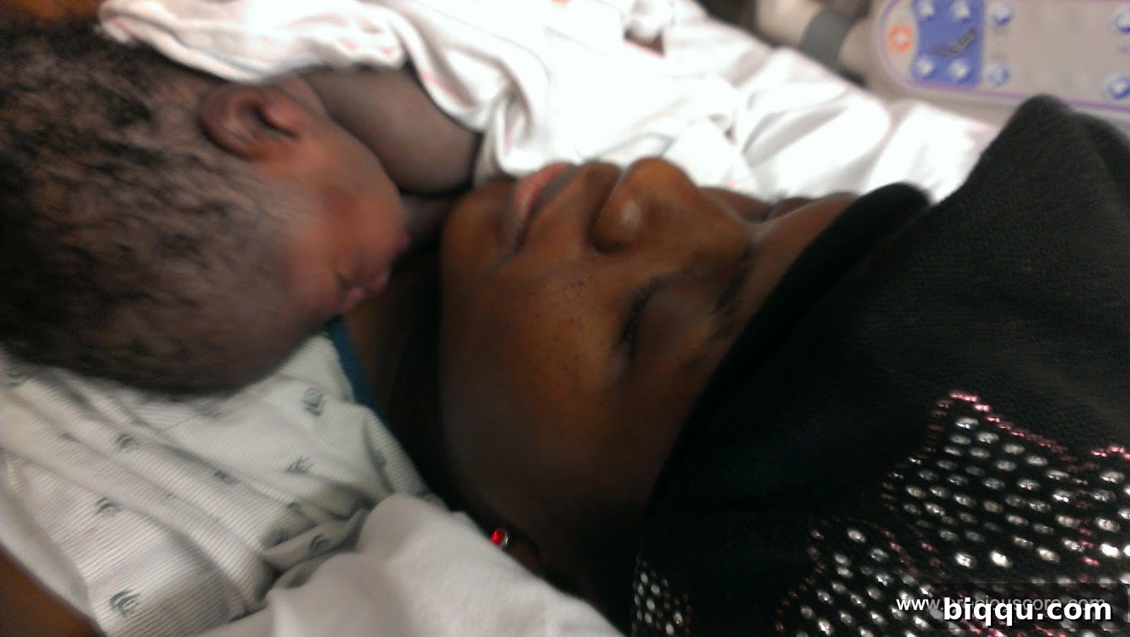 Newborn baby placed on mother's chest for bonding