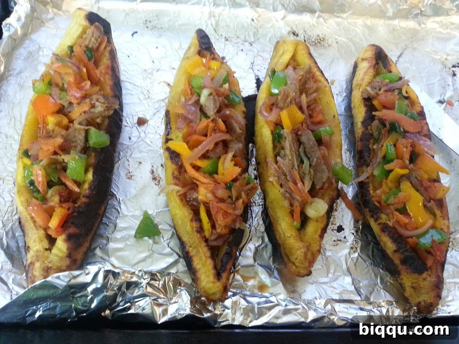 All plantain boats stuffed and ready for cheese