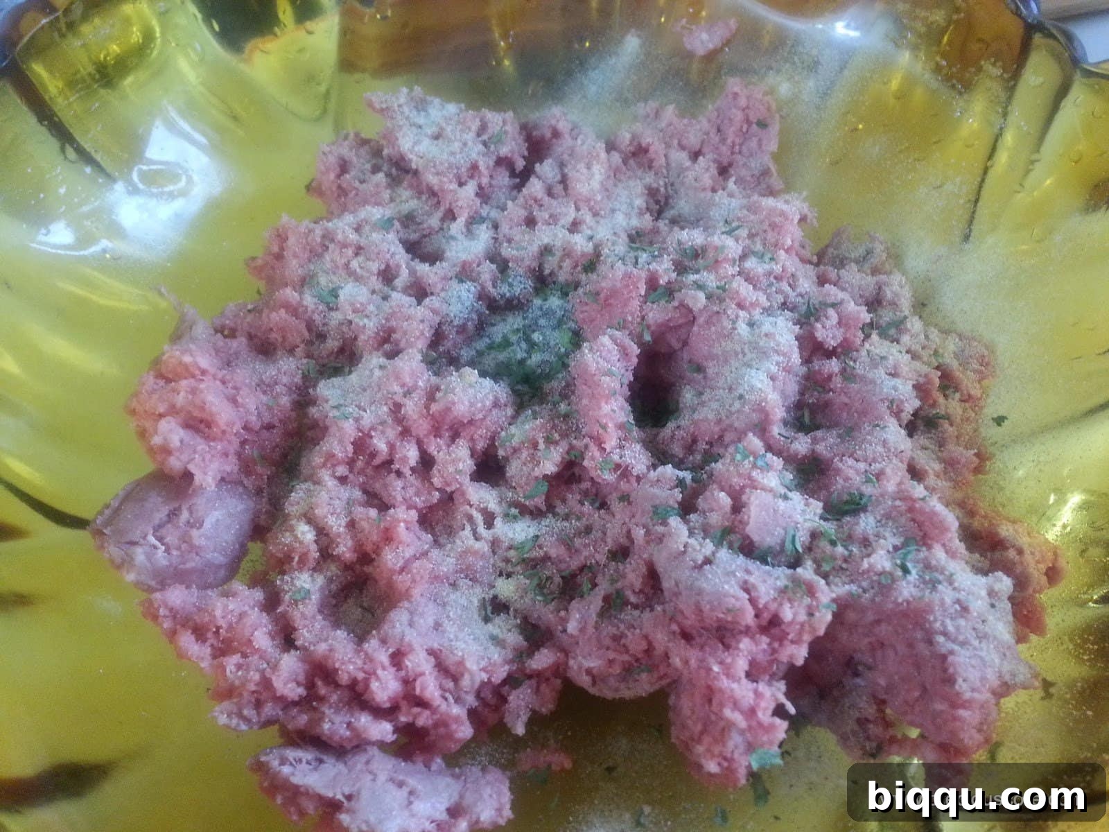 Seasoned ground beef mixture, perfectly combined and prepared for wrapping hard-boiled eggs.