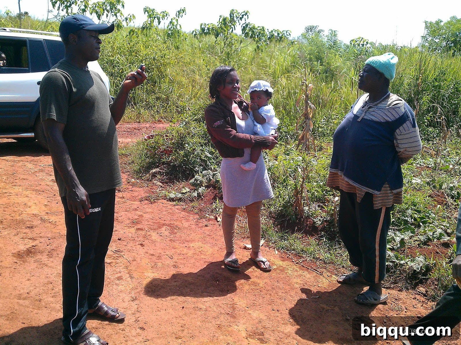 Author with her daughter in a natural setting in Cameroon.