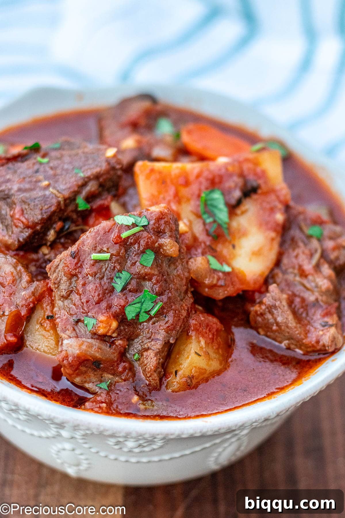 Hearty Beef Stew 4 Beef Stew Without Wine in a white bowl, ready to be served, emphasizing its delicious appeal.