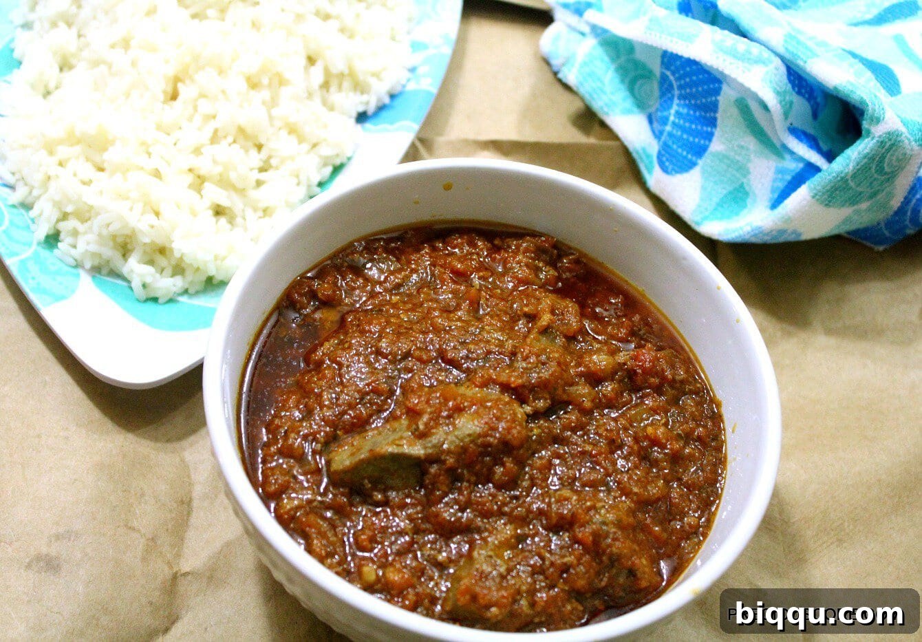 Rich and Spicy Beef Liver Sauce Served with Rice and Plantains
