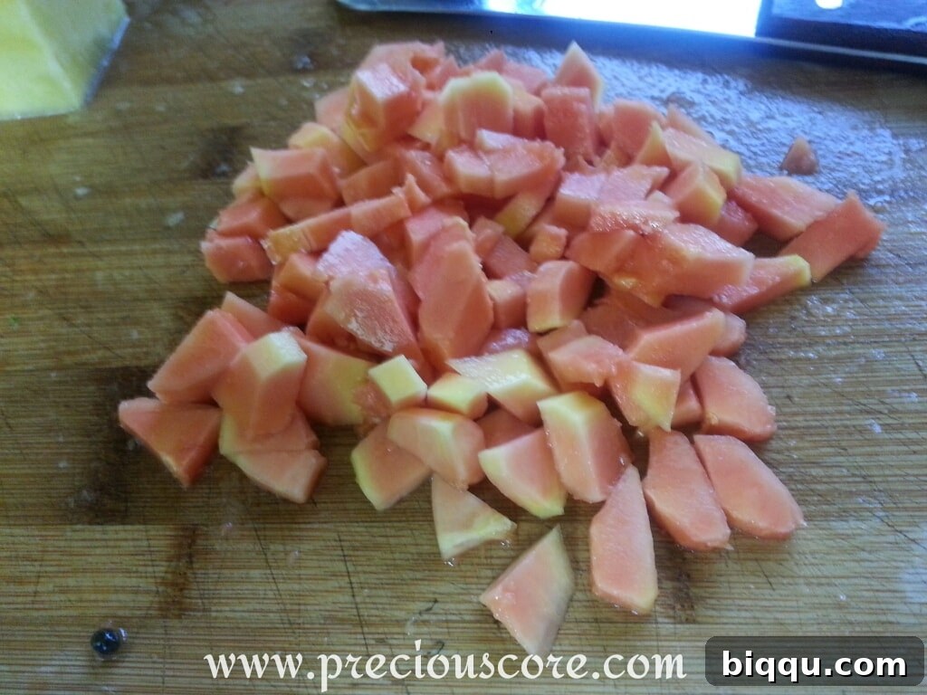 Diced papaya pieces for fruit salad