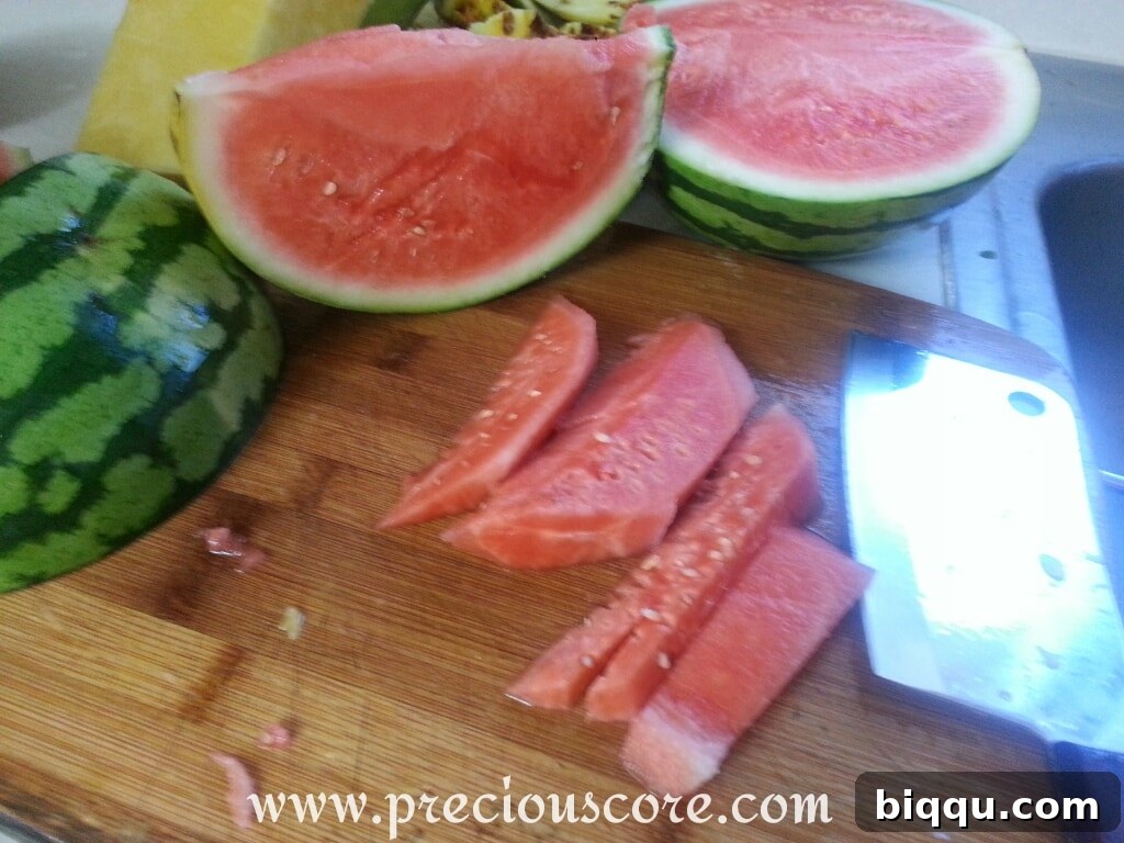 Watermelon being deseeded and cut