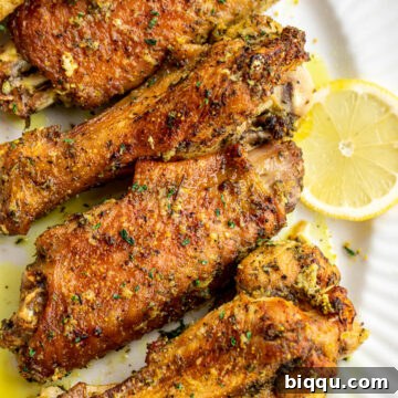 Lemon pepper turkey wings on a serving platter.