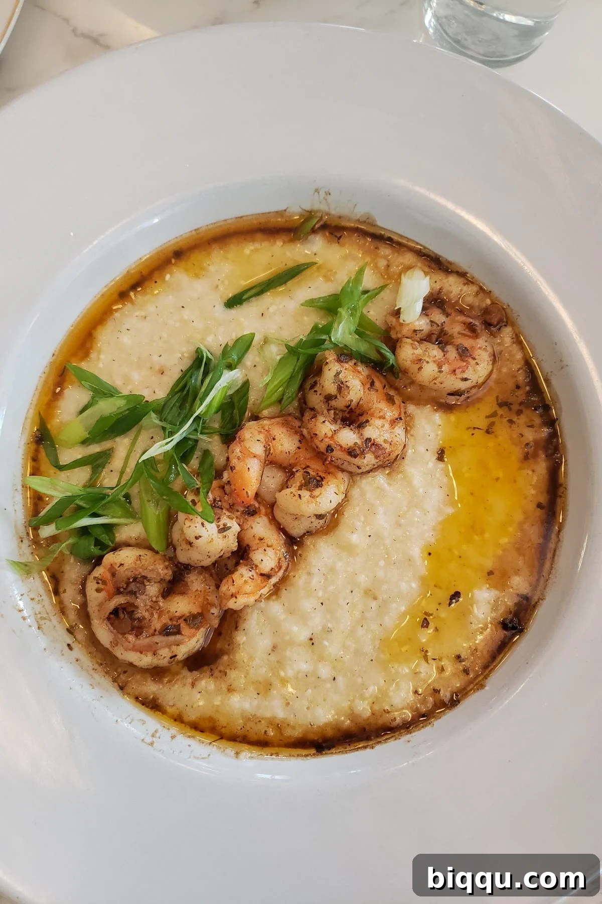 A plate of shrimp and grits at a restaurant in Austin, Texas.