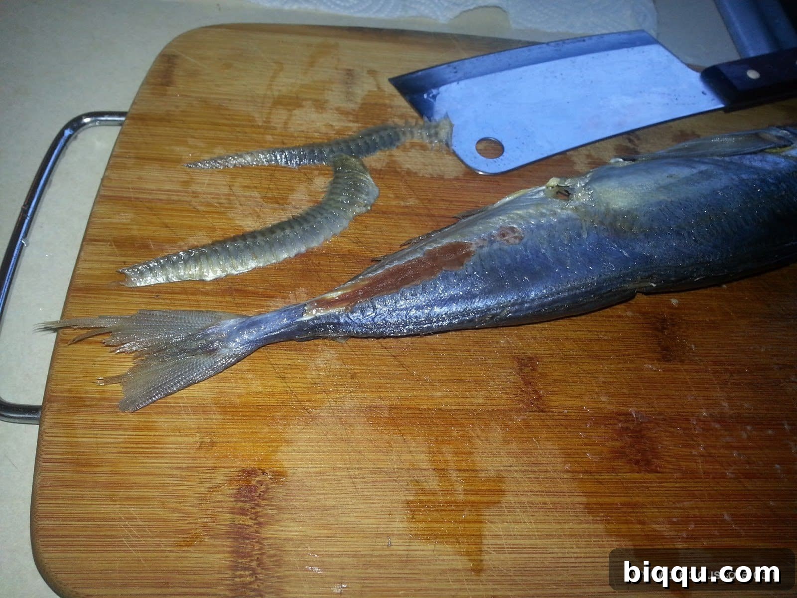 Cleaned fish, showing the gutted cavity and prepared state.
