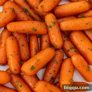 Glazed carrots on a plate.