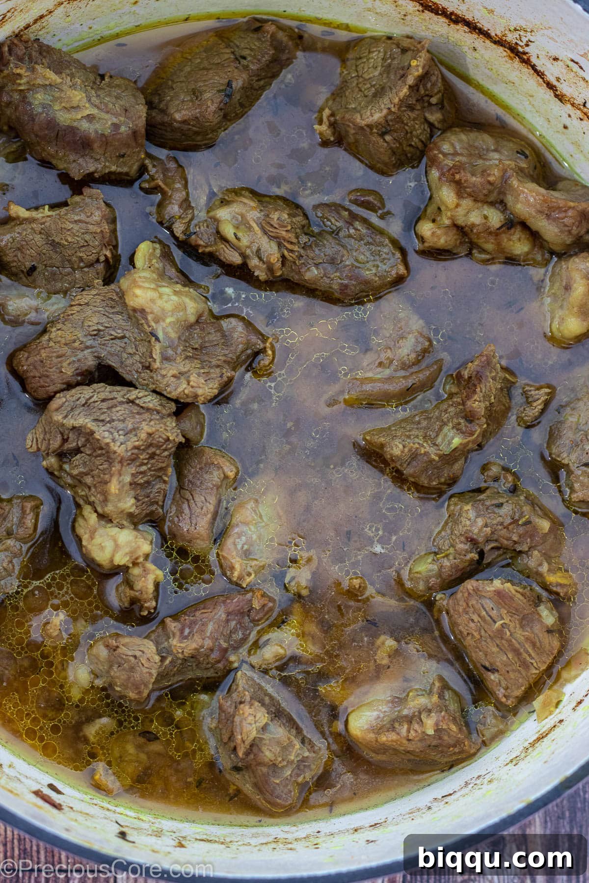 Cooked, tender beef in its flavorful stock.