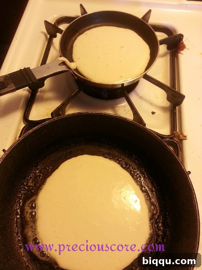 Cooking coconut pancakes on a skillet