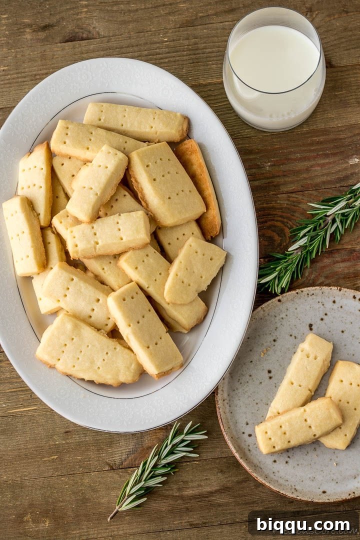 Effortless Homemade Shortbread 16 Shortbread cookies on plate and platter served with milk