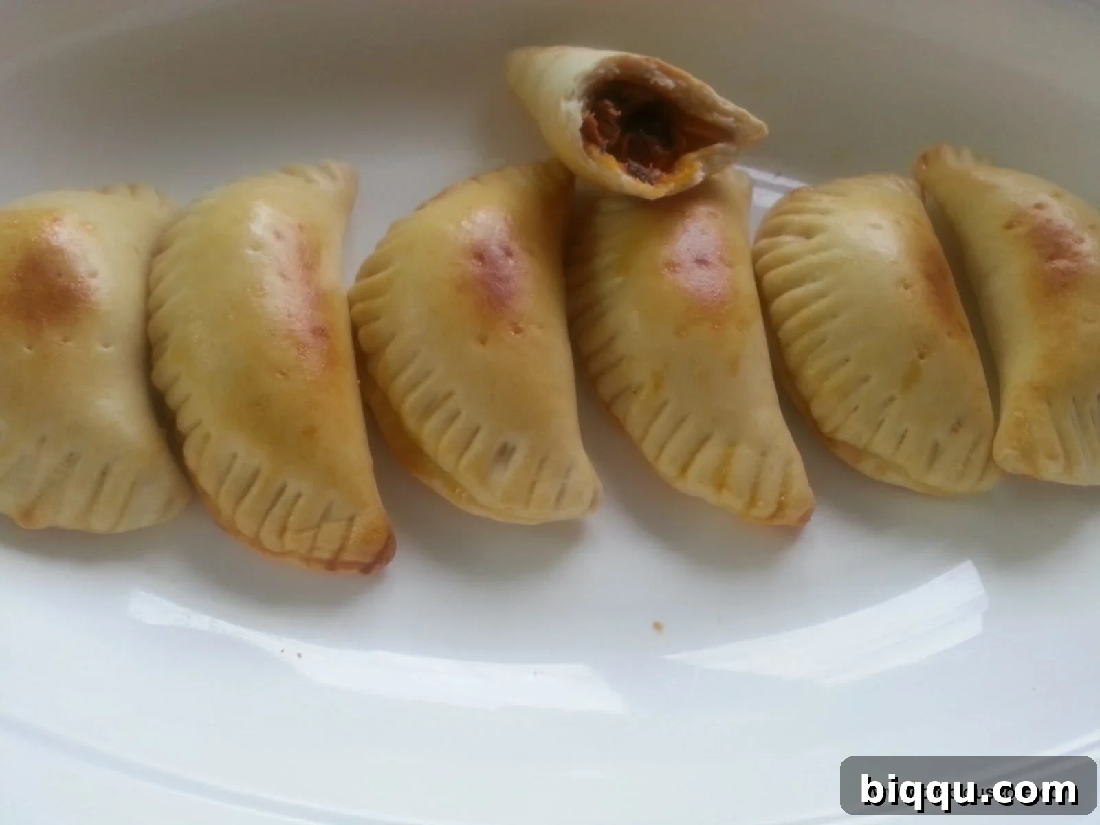 Golden brown homemade fish pies fresh out of the oven