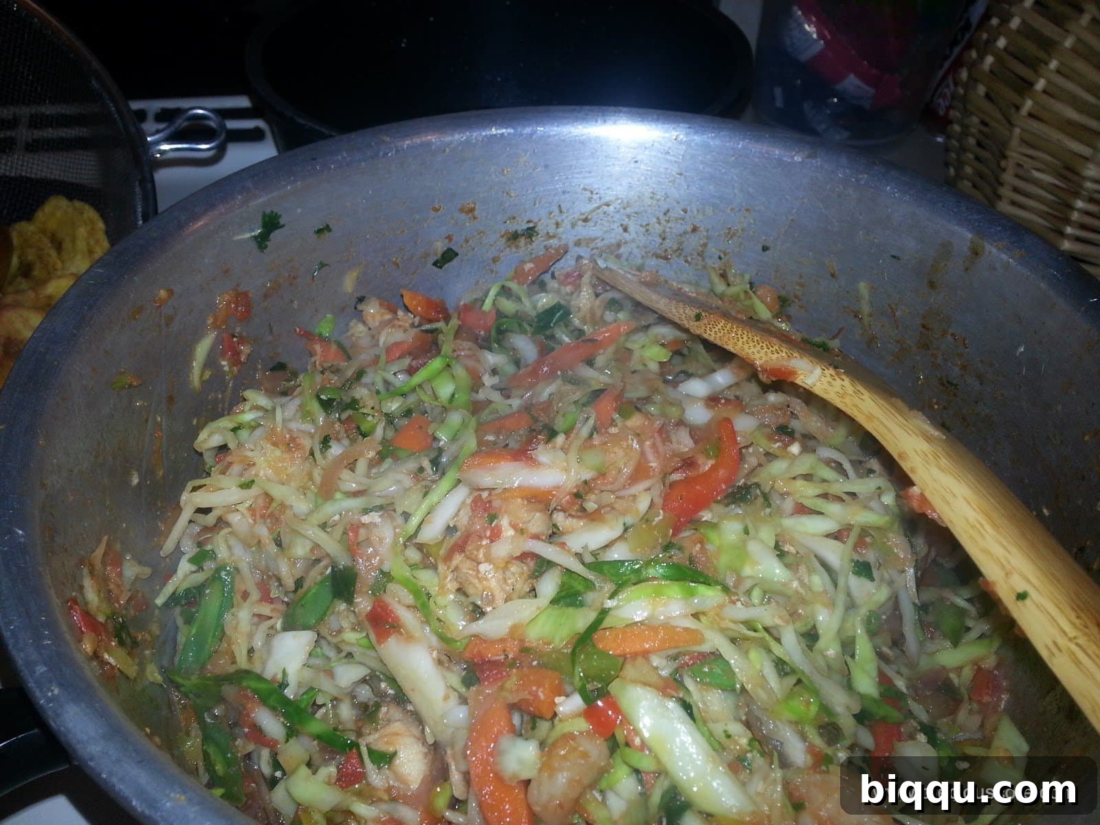 All the vibrant vegetables and protein combined in a pot, simmering to perfection.