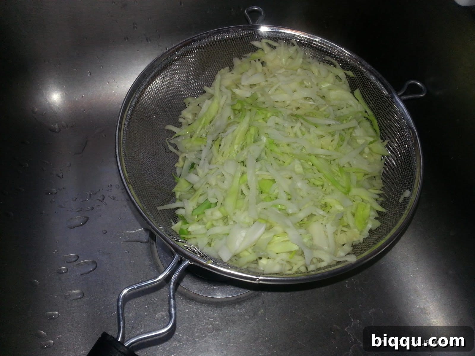 Blanched and perfectly prepared cabbage, drained and ready for the mixed vegetable stir-fry.