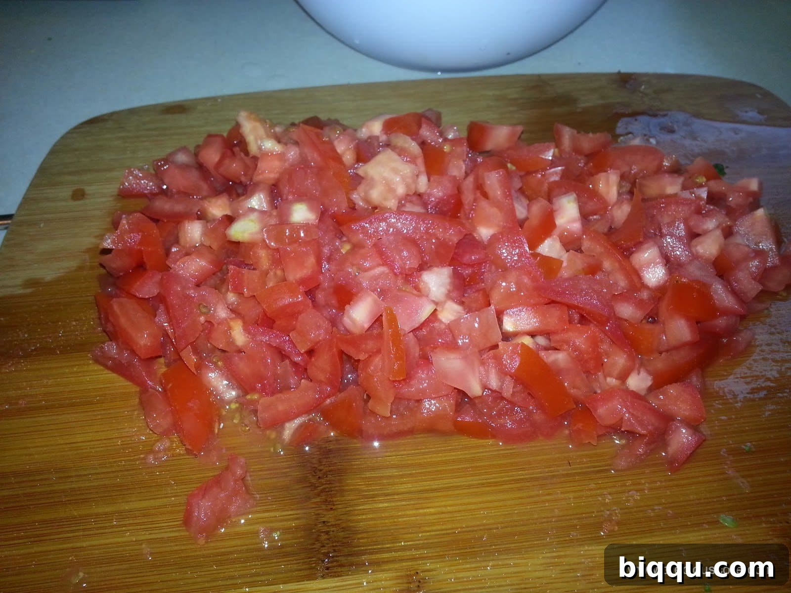 Fresh, diced tomatoes, a key ingredient for the vibrant sauce of the mixed vegetables.