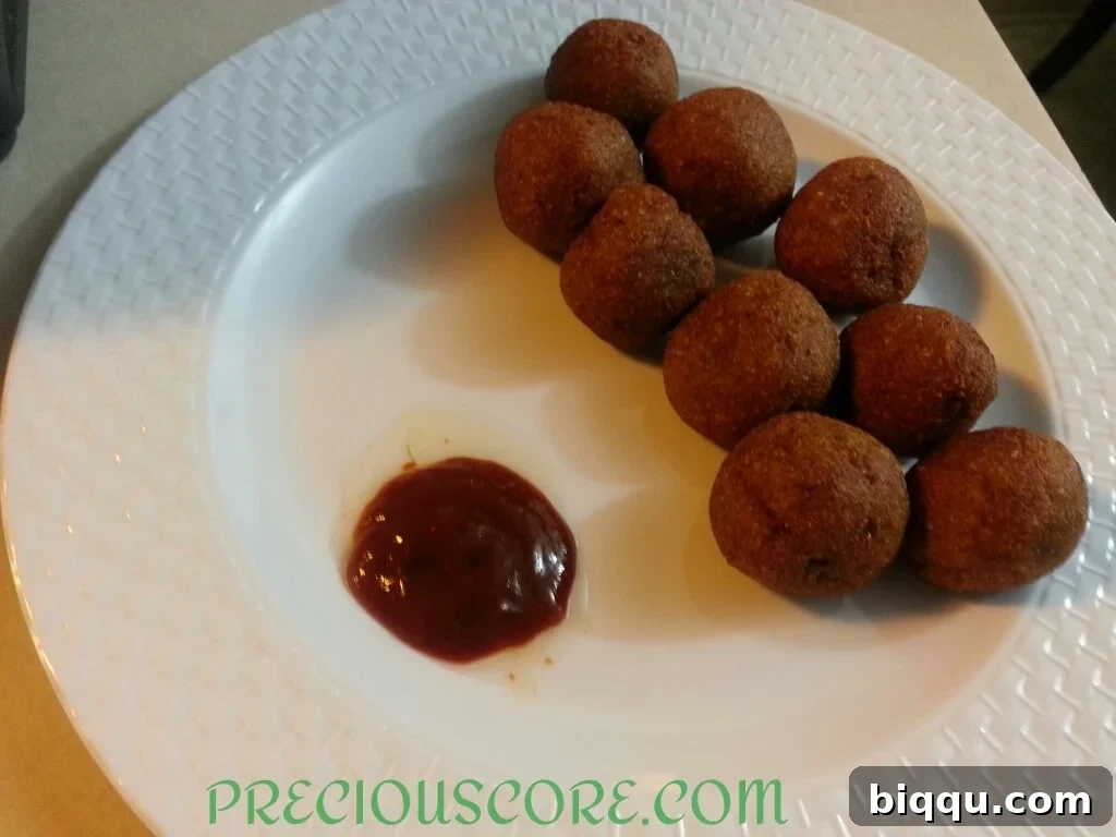 A plate of freshly made Accra Banana fritters, golden brown and ready to be served