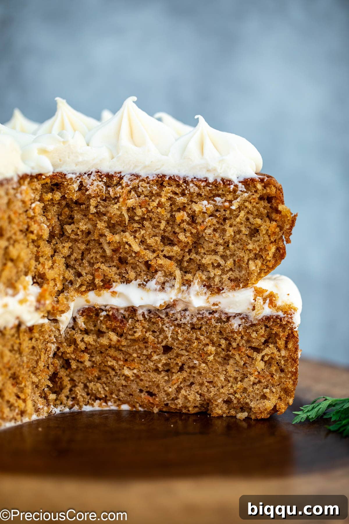Layered carrot cake with cream cheese icing.