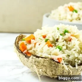 A close-up of creamy coconut rice, an easy and aromatic side dish.