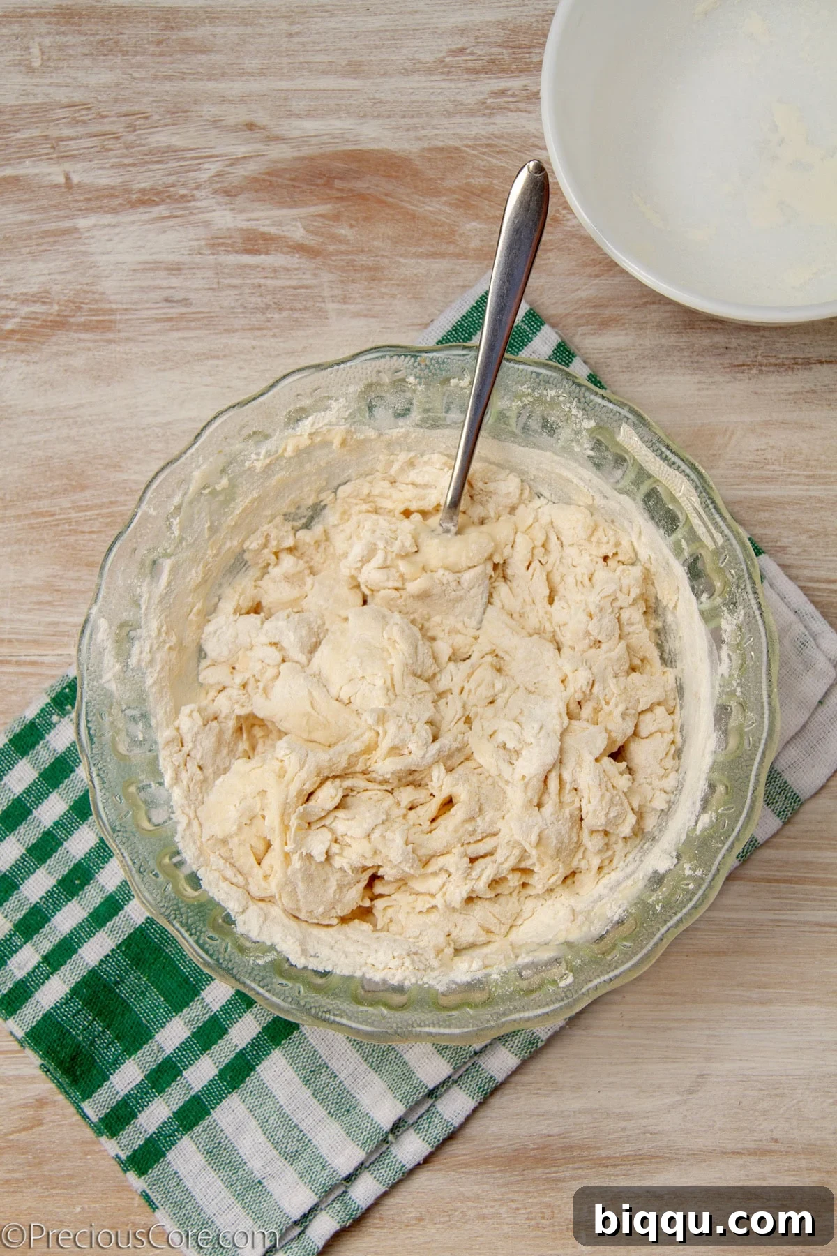 Mixing homemade pizza dough.