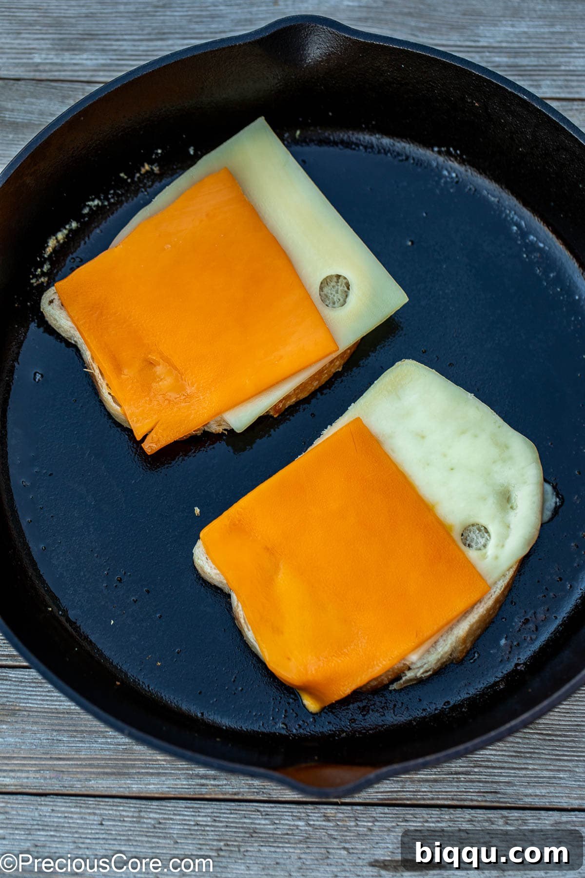 Slices of cheese on bread slices.