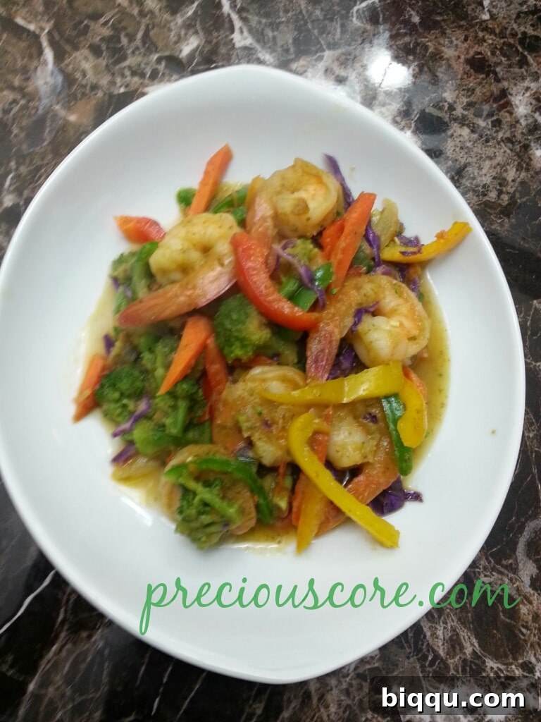 Shrimp and Veggies Stir Fry - A Culinary Delight A vibrant and delicious shrimp and vegetable stir fry, ready to be enjoyed.
