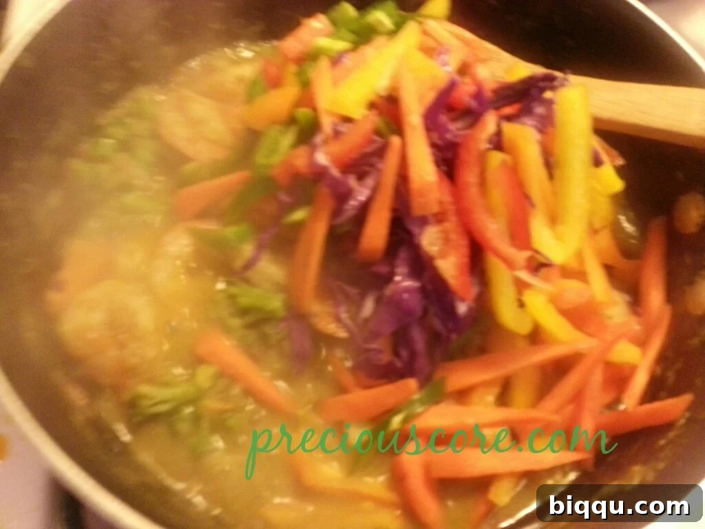 Dish Ready to Be Served! Close-up of the finished stir fry, glistening and ready to serve.