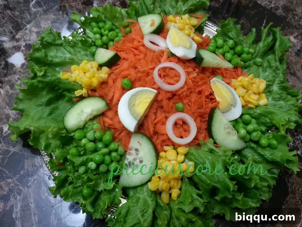 Sweet corn, green peas, and hard-boiled egg completing the vibrant and fresh lettuce salad