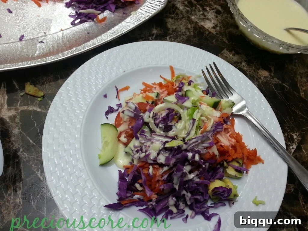 A large, vibrant and freshly prepared Cameroon salad bowl, bursting with color and ready to be enjoyed