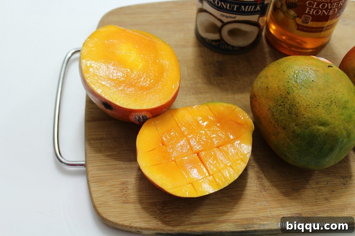 Mango half diced for eating