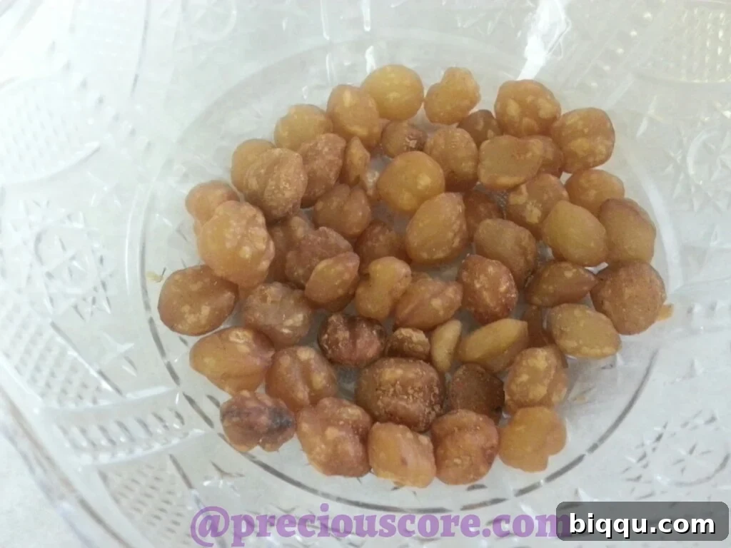 Close-up of Njansa nuts, a key ingredient in Cameroonian pepper soup.