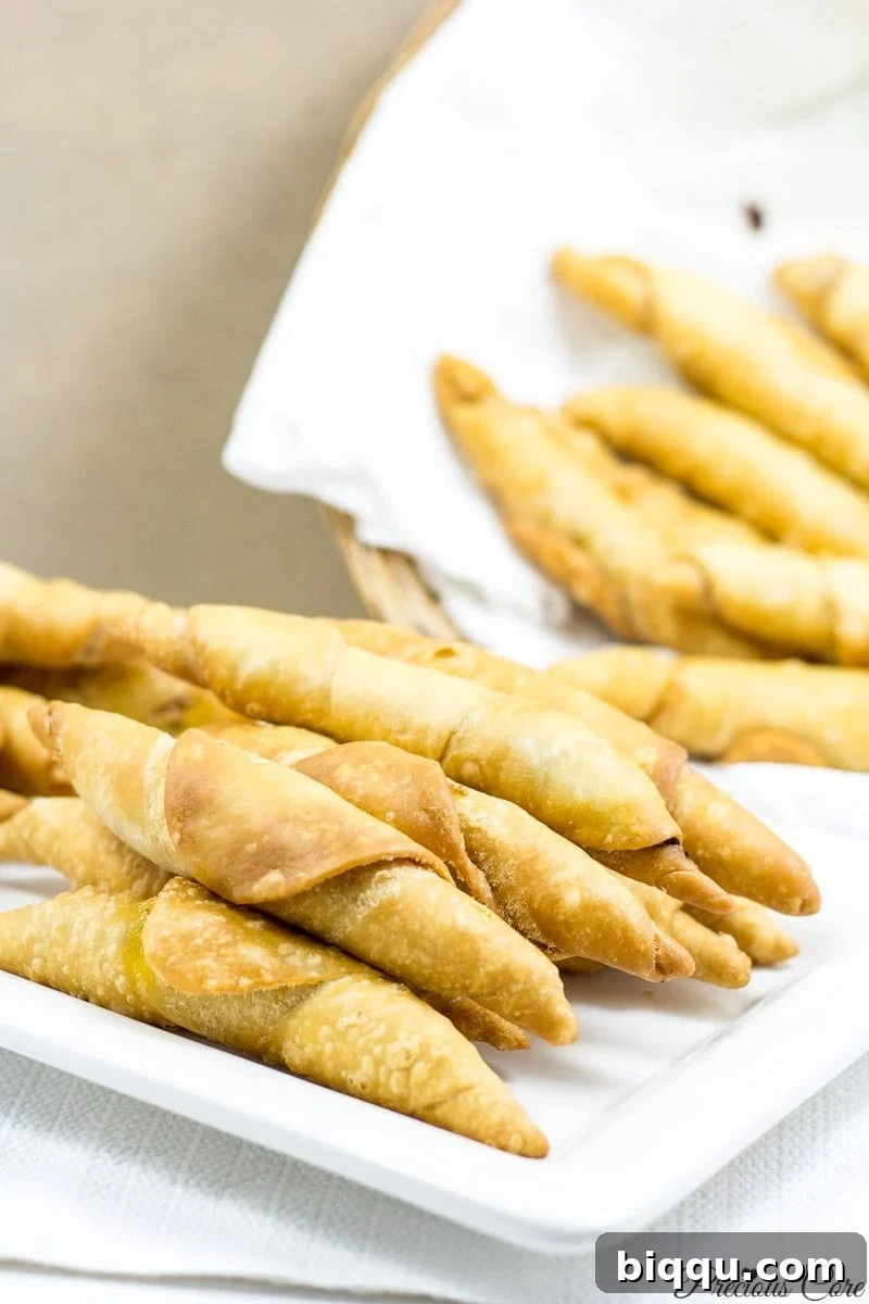 Plate and basket of Cameroonian fish rolls.
