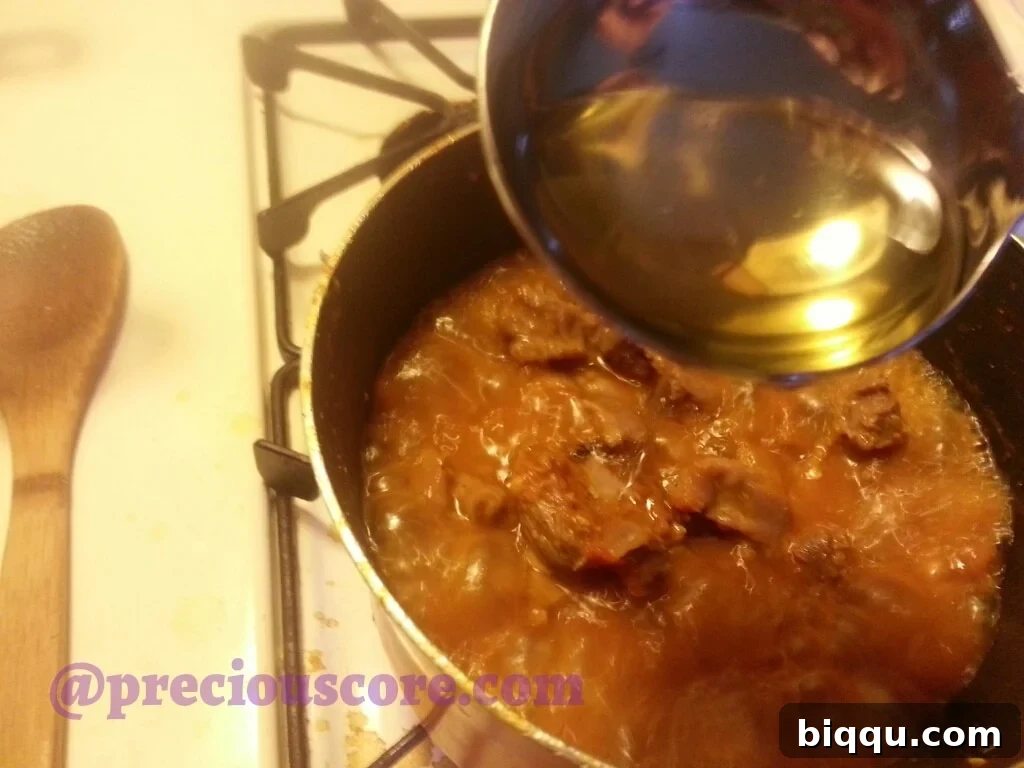 Gizzards simmering with reduced sauce