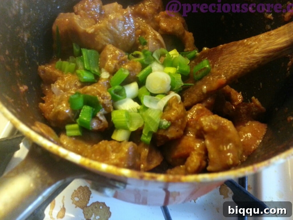 Finished Peppered Chicken Gizzards with green onions