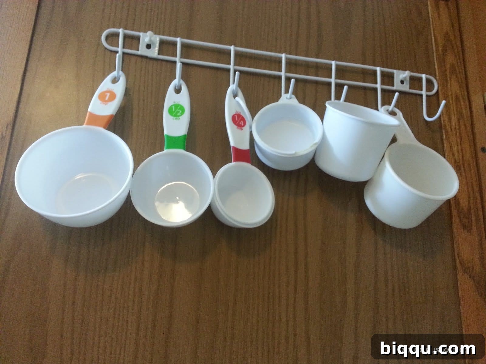 Space-Saving Measuring Cup Storage Hanging Measuring Cups on a Kitchen Rack