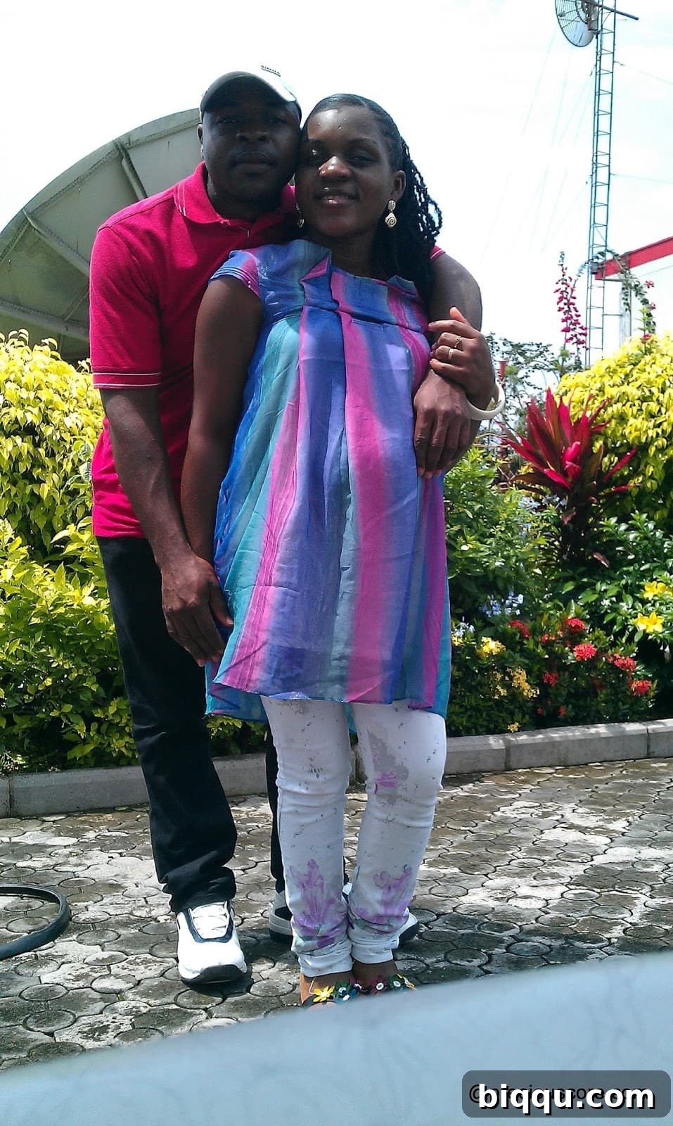 Pregnant woman enjoying a scenic view in Douala