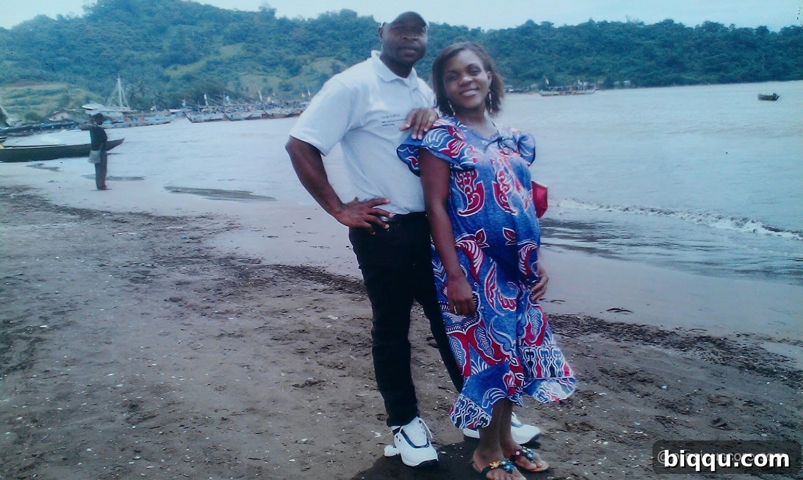 Pregnant woman relaxing by the beach at Down Beach, Limbe
